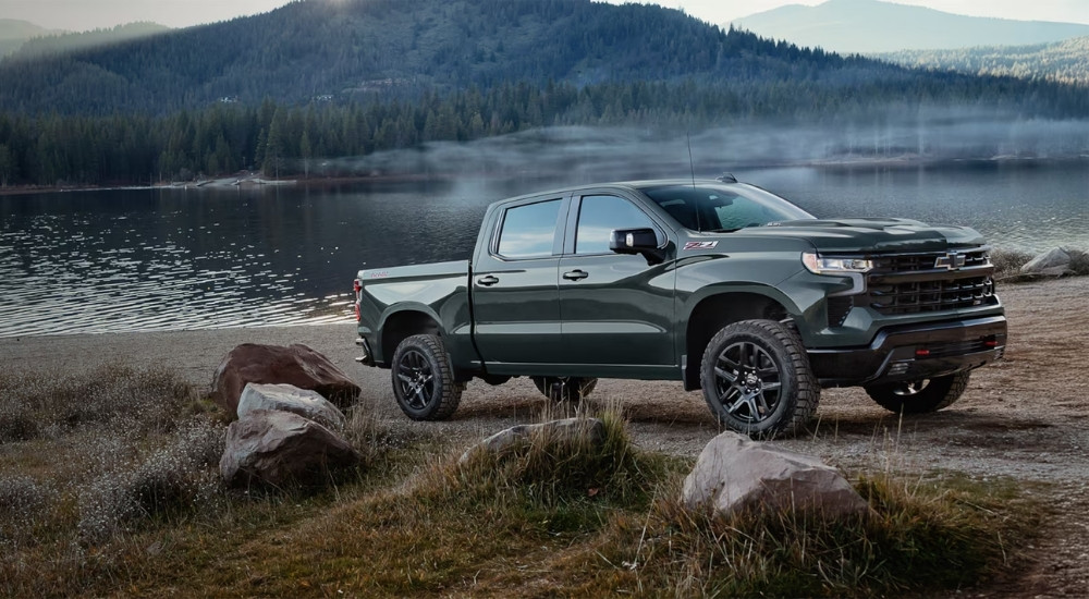 Dark grey 2026 Chevy Silverado 1500 parked near a lake