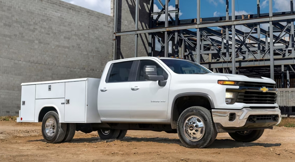 White 2026 Chevy Silverado 3500 HD Chassis Cab parked on a construction site