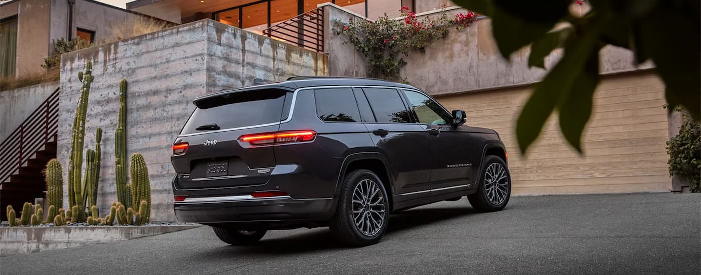 Grey 2026 Jeep Grand Cherokee parked in a driveway