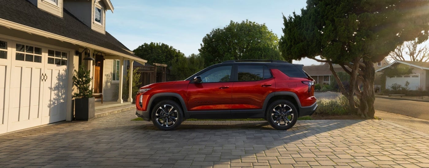 Red 2025 Chevy Equinox RS parked on a driveway
