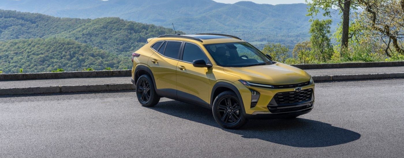 Yellow 2024 Chevy Trax ACTIV at an overlook