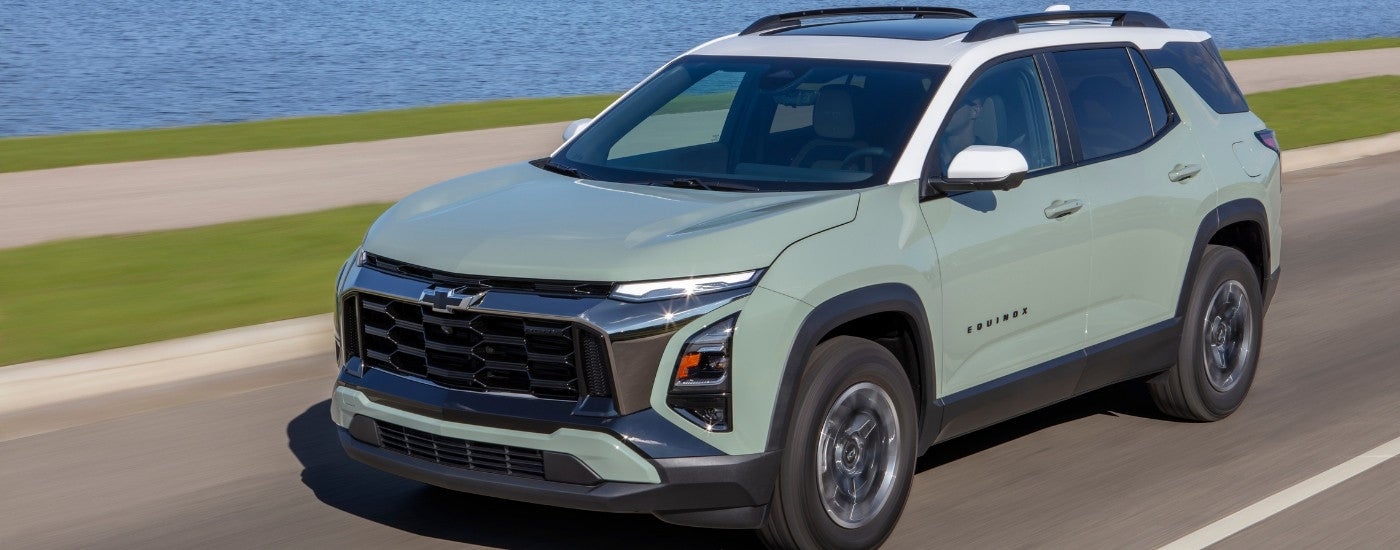 A green 2025 Chevy Equinox for sale from the front.