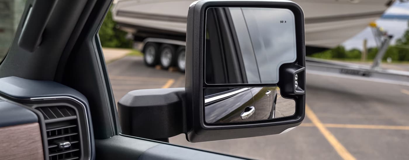 Side mirror on a 2025 Chevy Silverado 2500 HD for sale.
