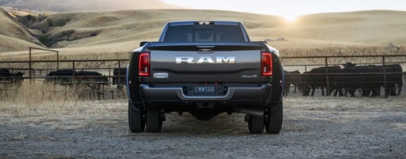 A grey 2025 Ram 3500 from the rear.
