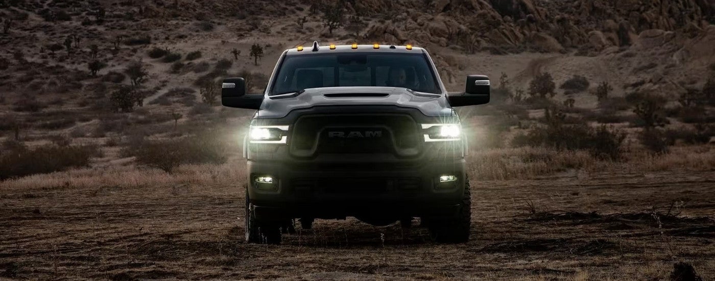 A popular Ram truck for sale, a grey 2024 Ram 2500, is shown at dusk. A popular Ram truck for sale, a grey 2024 Ram 2500, is shown at dusk.