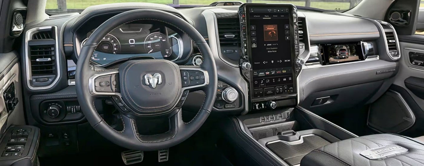 The interior of a 2025 Ram 1500, a Ram truck for sale near North Platte, from the driver's seat. The interior of a 2025 Ram 1500, a Ram truck for sale near North Platte, from the driver's seat.