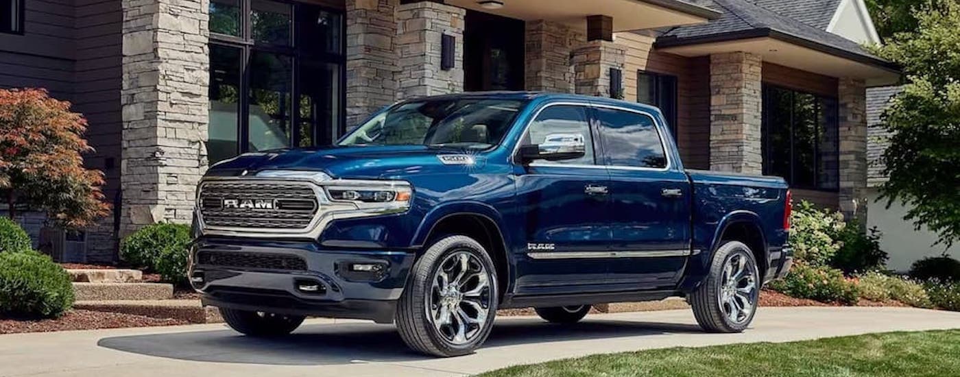 A blue 2023 Ram 1500 from the front at an angle.