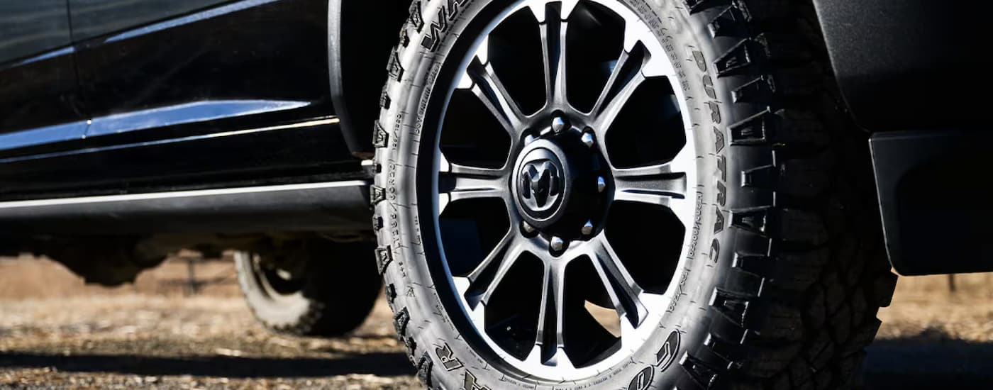 Tire on a black 2025 Ram 2500 work truck for sale.