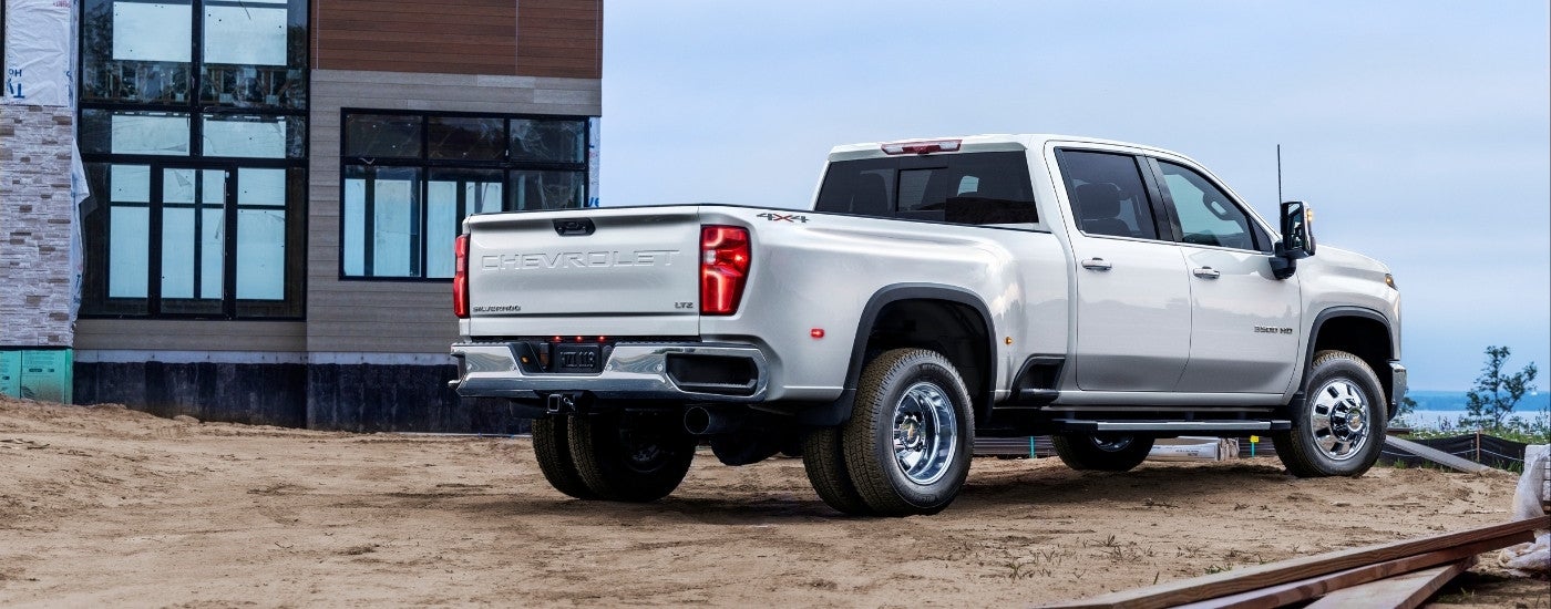 A white 2025 Chevy Silverado 3500 from the side.