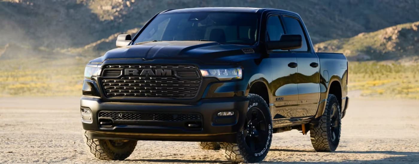 Black 2026 Ram 1500 parked off-road